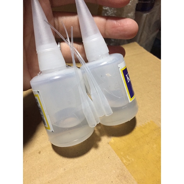 1 chai keo dán hột ko làm mờ hột