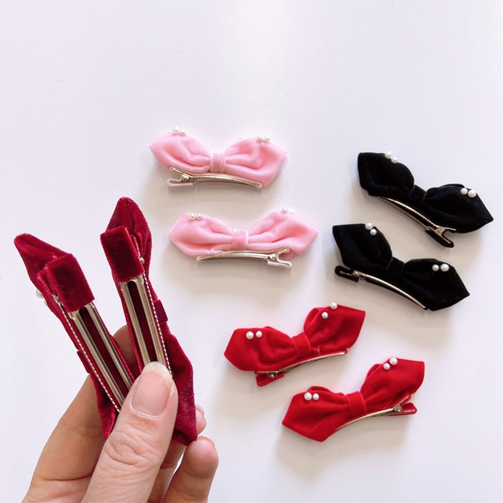 Set 2 kẹp tóc nơ bằng vải nhung đính ngọc trai nhân tạo màu trơn dễ thương đơn giản phong cách Hàn Quốc cho bé gái