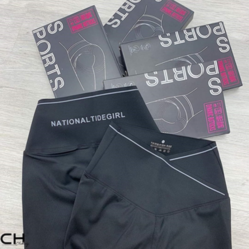 Quần legging nữ cạp cao dài vải Umi co giãnviền sọc kẻ trắng vạt chéo gen bụng nâng mông màu đen mặc tập gym ở nhà đẹp
