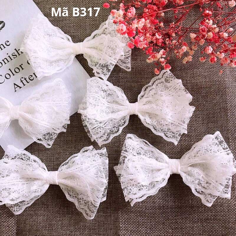 B317 - Cặp tóc nơ ren nhiều tầng tinh khôi