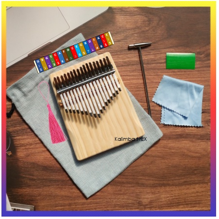 Đàn kalimba 17 phím gỗ thông nguyên tấm âm vang không tịt nốt tặng tuner, giấy dán, dây treo trang trí