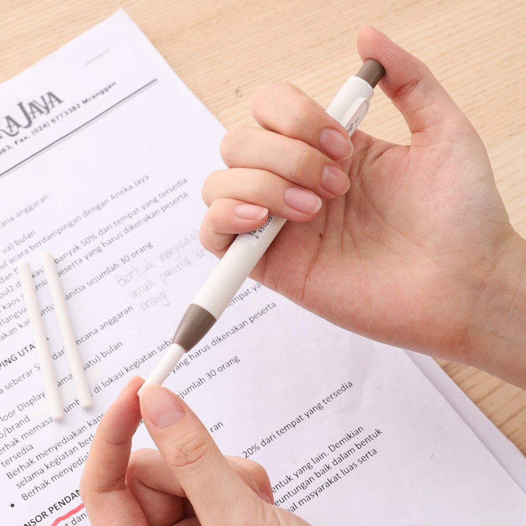 Tẩy chì 2B dạng bút bấm Deli có bán lõi thay EH 01800 / 01912