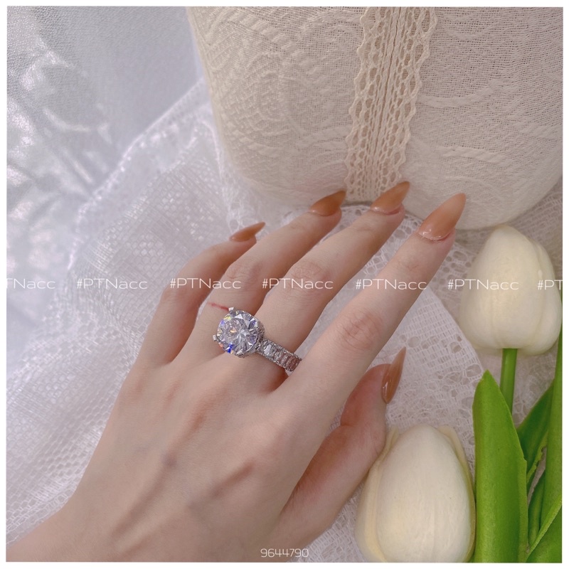 Nhẫn xi bạch kim 4 chấu hột chủ to 9li siêu sáng .PTNACC.