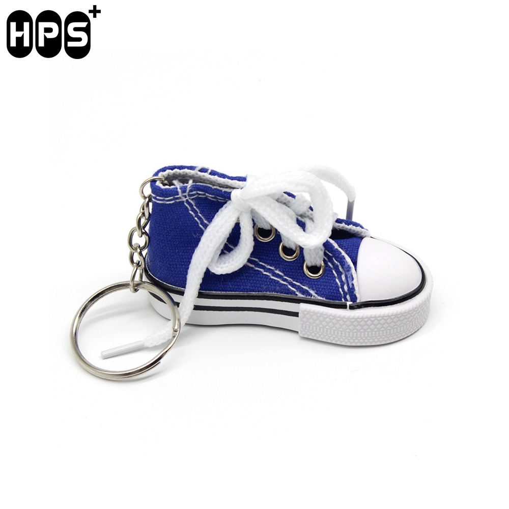 Vỏ bọc chân chống xe máy hình giày thể thao mini vui nhộn