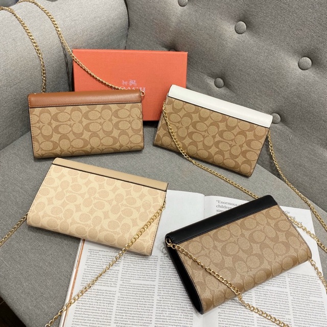 Túi - ví cầm tay viền đinh