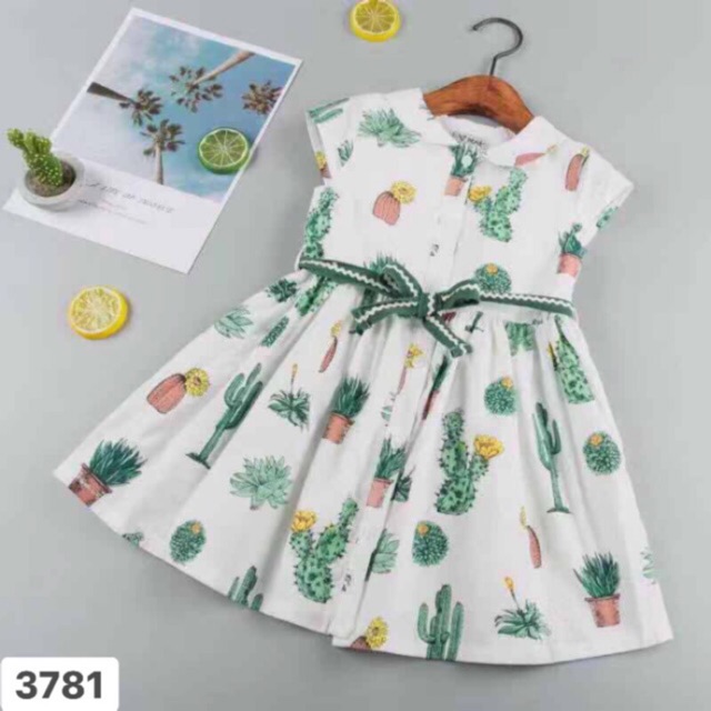 Váy vải xô hoạ tiết xương rồng xinh xắn.