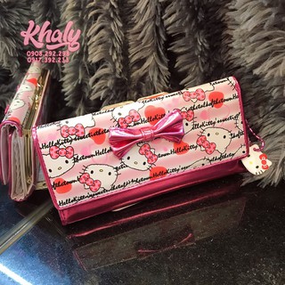 Bóp ví tiền cầm tay nút bật da mềm phối da bóng Hello Kitty nơ to nhiều ngăn size dài màu hồng cho nữ và các bạn gái