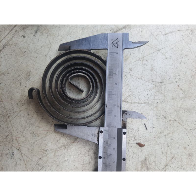 Lò xo máy khoan bàn