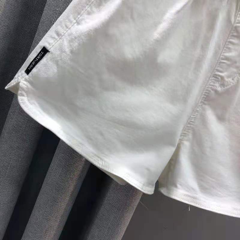 Quần short denim trắng chữ A lưng thun thể thao nóng bỏng Châu Âu