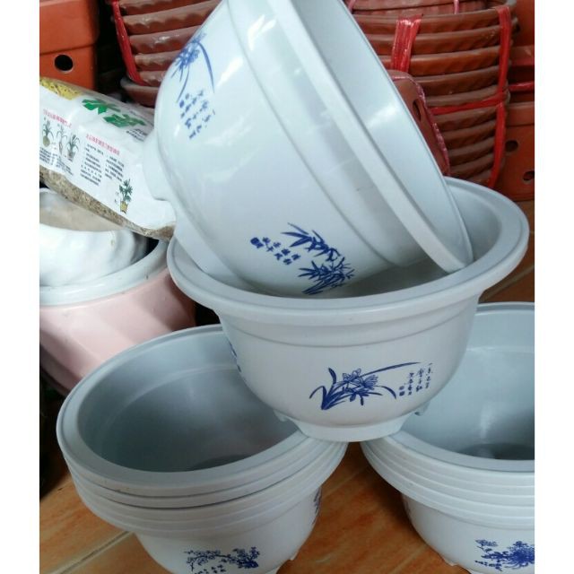 - 10 cái chậu nhựa hoa văn trồng hoa phi 23cm x14cm hàng cty, loại 1.