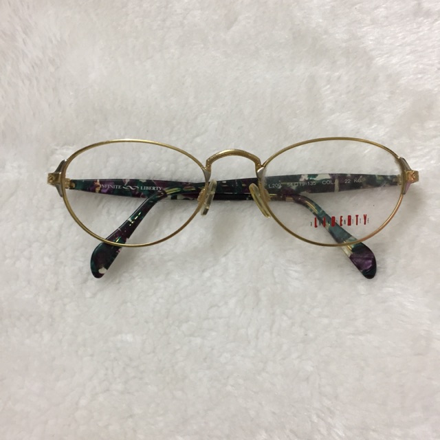 Gọng kính lão nữ INFINTTE LIBERTY hàng bãi mạ vàng 22 KGP Mã L209