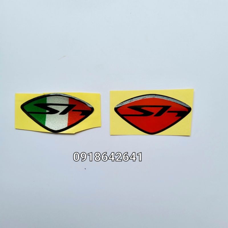 Logo mặt nạ Sh ý