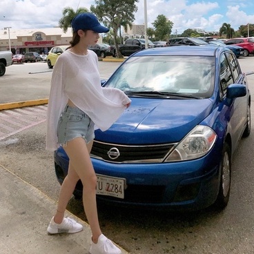 Áo thun ZHELIHANGFEI tay dài cổ tròn dáng rộng thiết kế xẻ tà thời trang