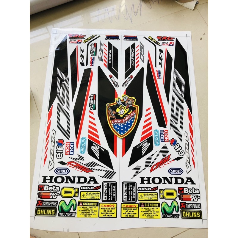 ( Quí khách vui lòng mang ra tiệm cho thợ dán ) vario trắng đỏ