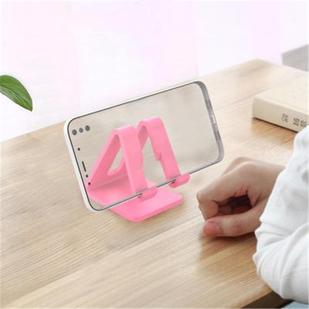 Giá đỡ điện thoại / máy tính bảng bằng nhựa chống sốc nhiều màu tiện dụng