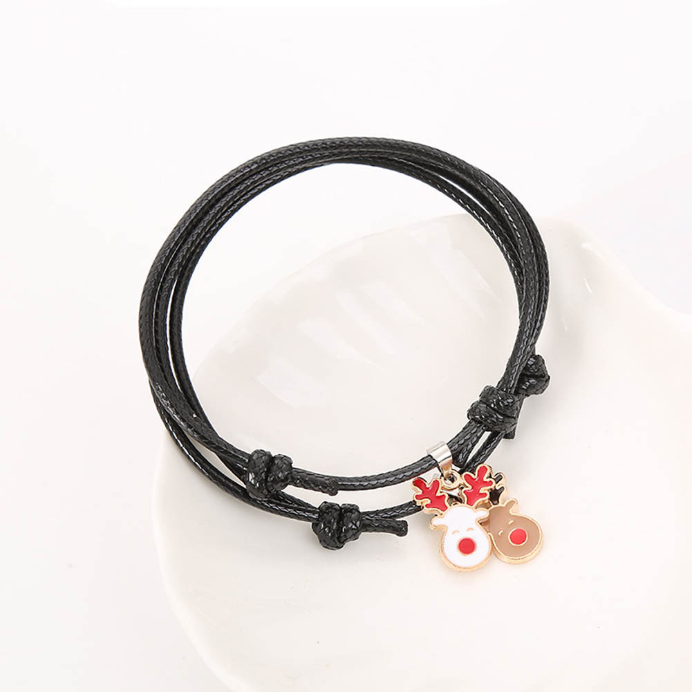 Vòng đeo tay màu đen chủ đề Giáng Sinh xinh xắn