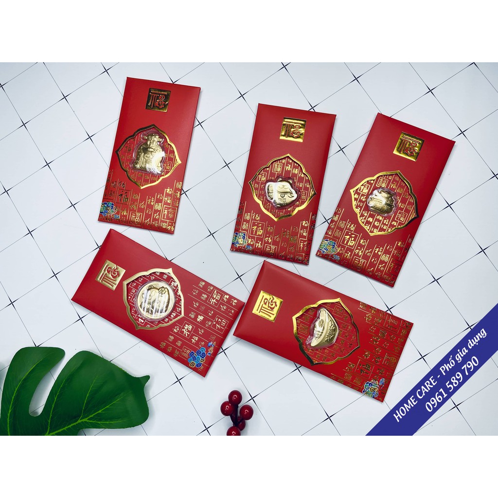 Bao lì xì mạ vàng ,Thần tài  Bao lì xì mạ vàng 24K gồm 4 mẫu mã: Ông Thần Tài, Mèo thần tài, Đ