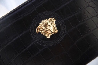 Clutch cầm tay da rắn
