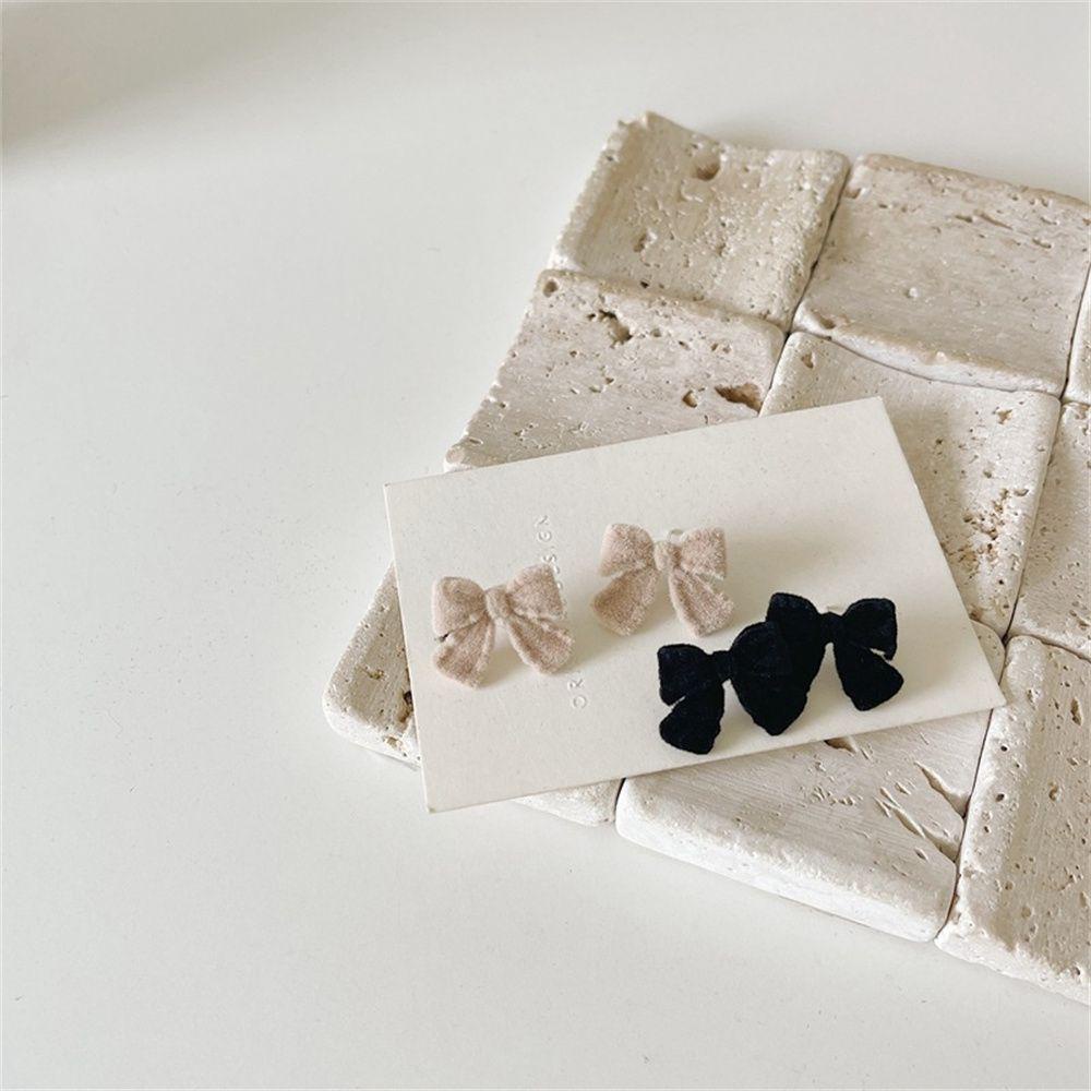 Bông Tai Dáng Dài Đính Nơ Thời Trang Xinh Xắn