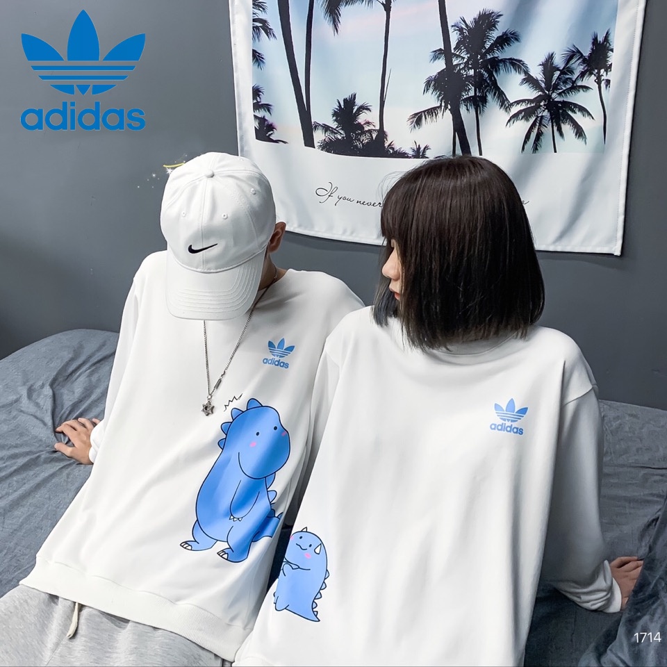 Áo thun tay dài cổ tròn 100% cotton in hình khủng long hoạt hình Adidas cho nam và nữ