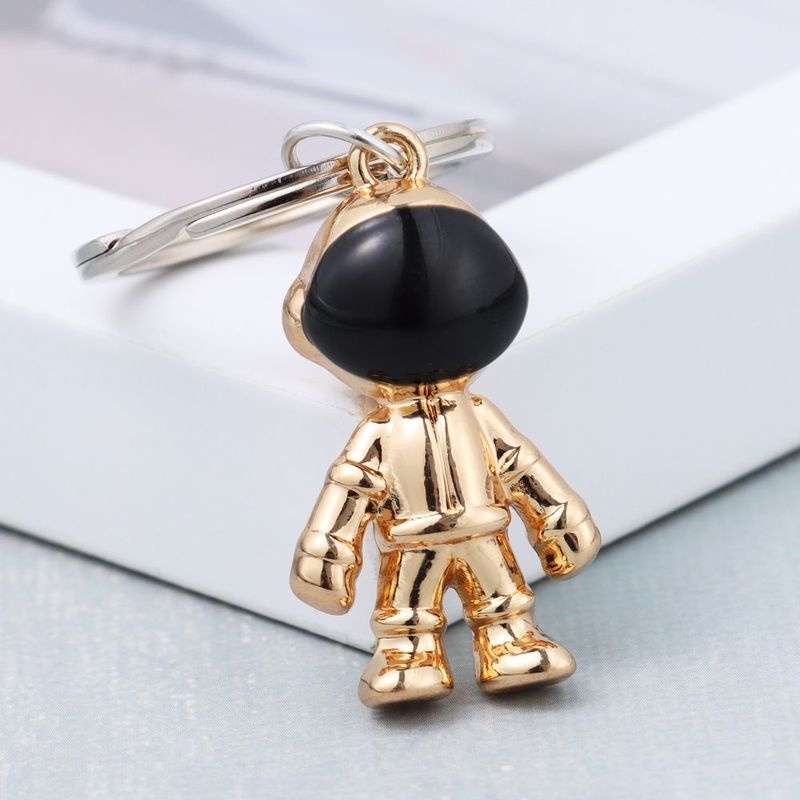 Móc khóa hình phi hành gia 3D bằng kim loại độc đáo trang trí túi xách