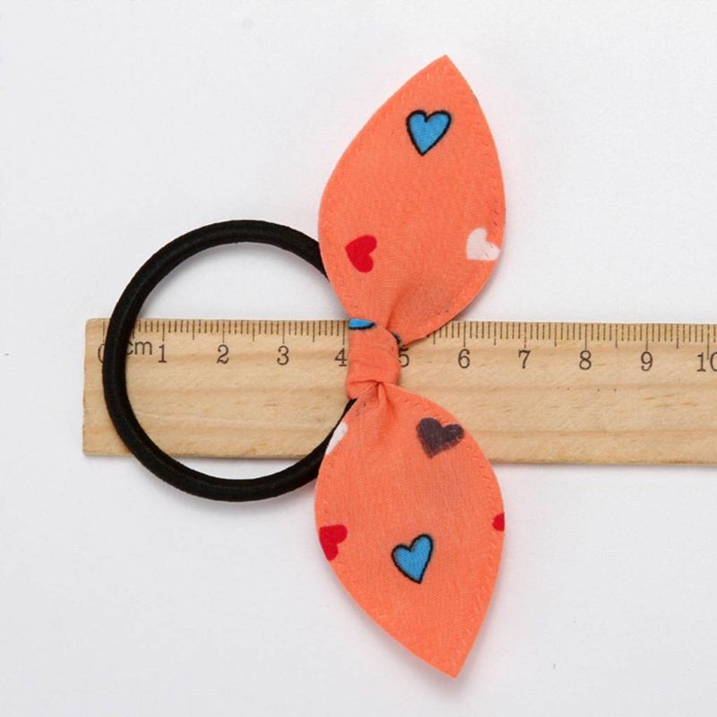 Thun Buộc Tóc Tai Thỏ Chấm Bi Cho Nữ