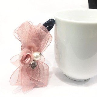 Cặp dọc nơ tạo phồng chân tóc