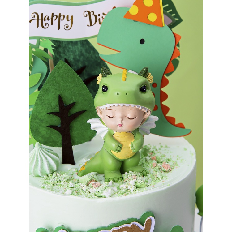 Trang trí sứ em bé khủng long xanh ngồi