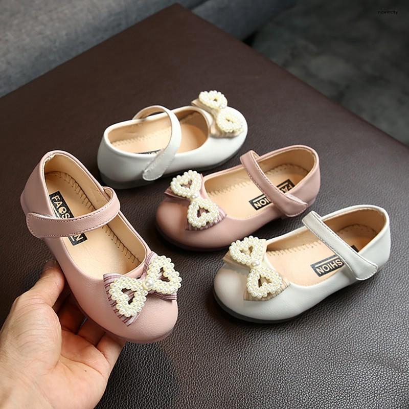 Giày búp bê da PU đính nơ và ngọc trai xinh xắn dành cho bé gái