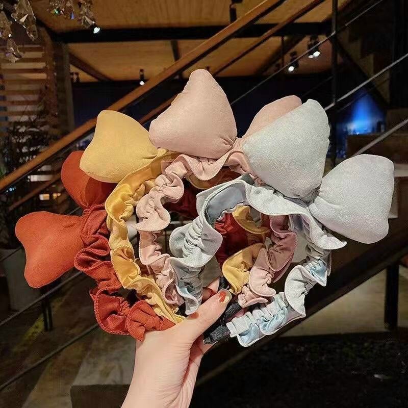 Cài tóc nhún nơ phồng to