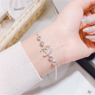 LẮC TAY CHỮ X BẠC TA