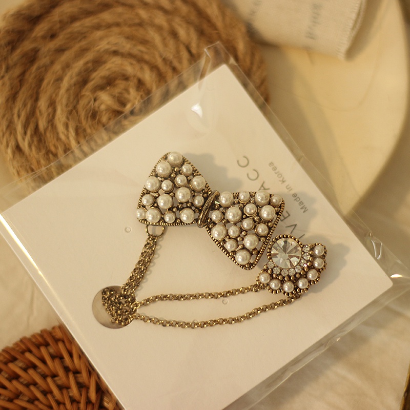 Ghim cài áo hình nơ phối dây xích phong cách vintage thời trang cho nữ