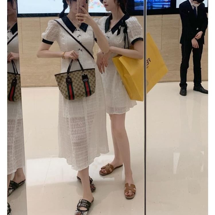 Đầm polo dáng dài ôm eo đính nơ xinh xắn cho nữ