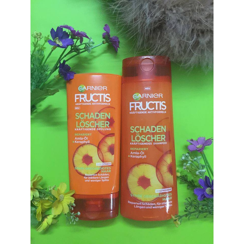 Bộ dầu gội Garnier Fructis dành cho tóc hư tổn nặng do uốn nhuộm.