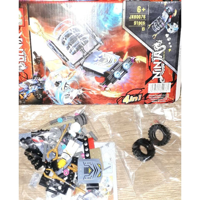 Lắp ráp 1 hộp LegoNinja Xe chiến đấu JX80076 có nhiều chi tiết bằng nhựa