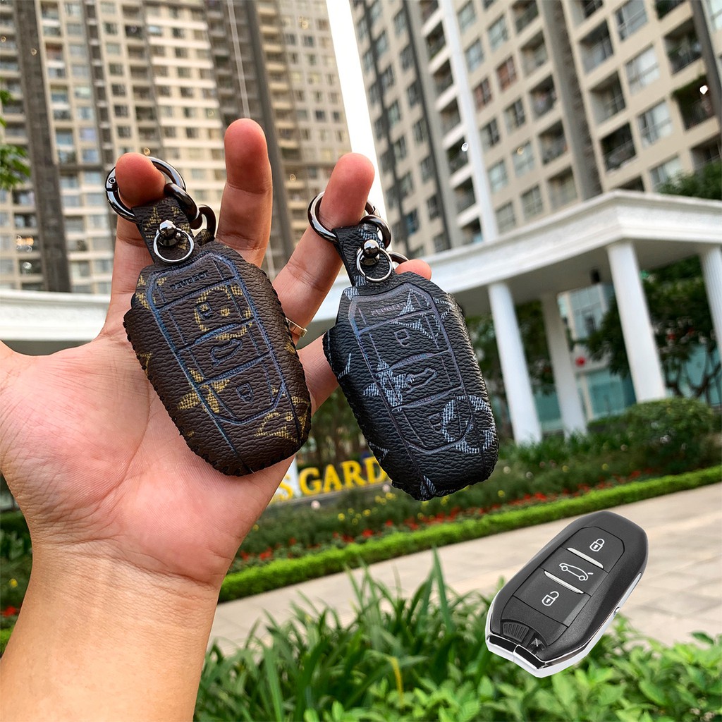 Đựng smartkey Peugeot 2008 3008 5008 Handmade da thật PEV AD có tay cầm