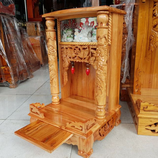 Bàn thờ thần tài ông địa gỗ xoan ngang 42 cm quỳ trụ điện tử