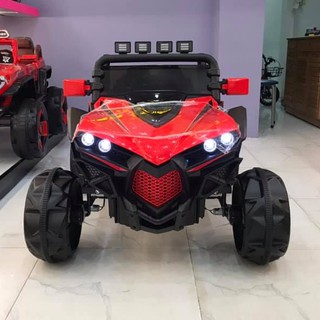 Ô tô xe điện siêu địa hình XJL588 đồ chơi vận động cho bé 2 ghế 4 động cơ ( Đỏ-Trắng-Xanh)