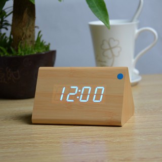 Đồng hồ gỗ hình tam giác có đèn LED - Winz.vn