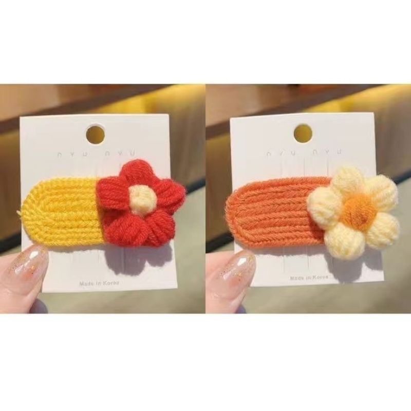 Kẹp tóc len hình bông hoa