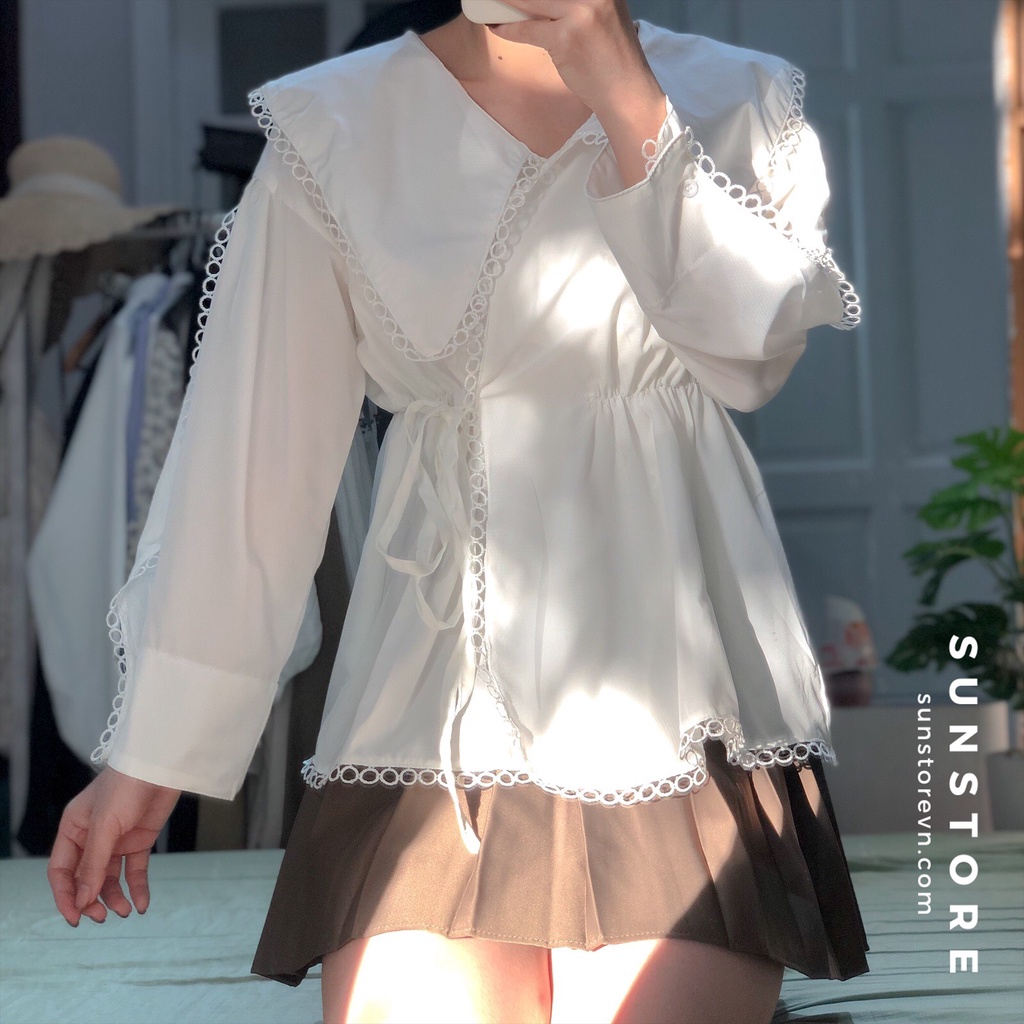 Áo sơ mi trắng rút eo viền ren