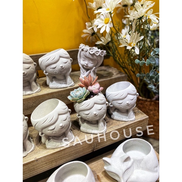 Chậu xi măng cô gái nhỏ  SP044