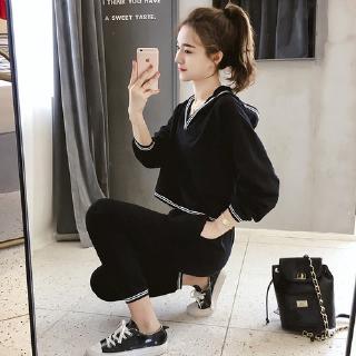 Bộ quần áo thể thao với áo dài tay có nón và quần dài thời trang cho nữ