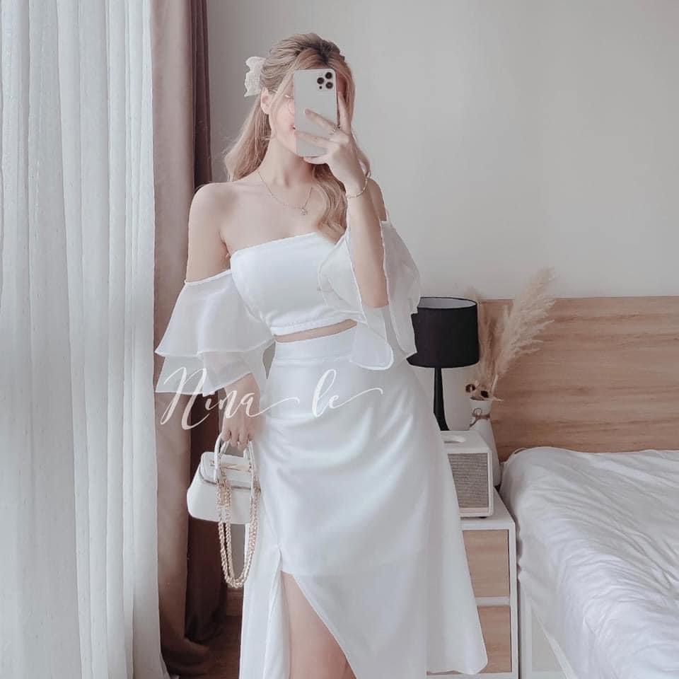 SET ÁO VÁY XINH ĐIỆU ĐÀ . Áo trễ vai cup ngực phối tơ nhũ trắng mix chân váy xẻ tà cực đẹp.