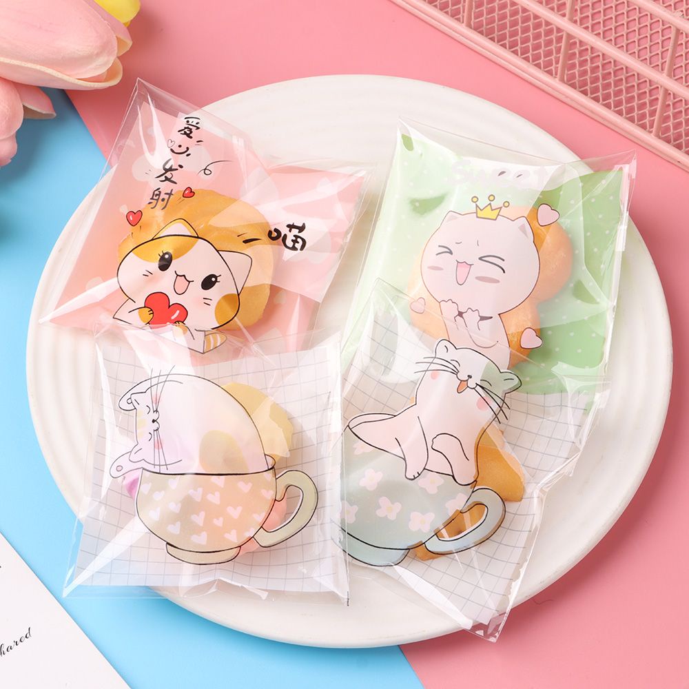 Set 100 Túi Nhựa OPP Kích Thước 7x7cm In Họa Tiết Mèo Hoạt Hình Có Keo Dán Dùng Để Đựng Bánh Quy
