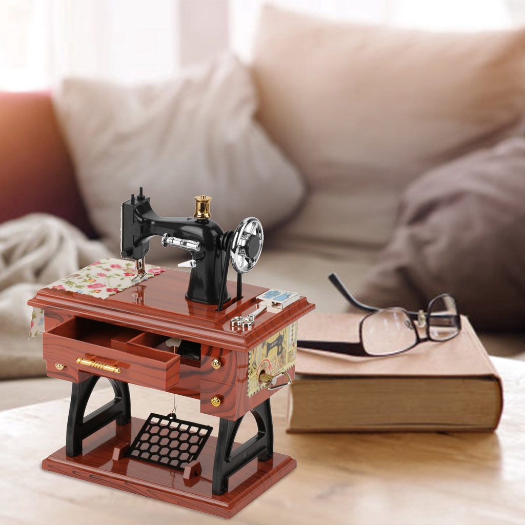 Hộp nhạc mini hình dạng máy may đồ chơi