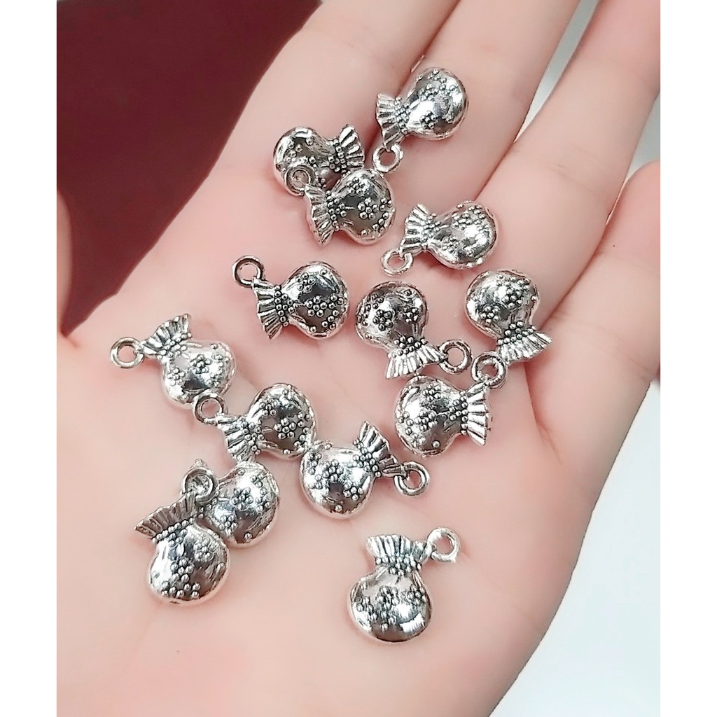 Sỉ charm bạc cổ : 50g / 1 gói = 23k [ Giá sỉ Charm ]