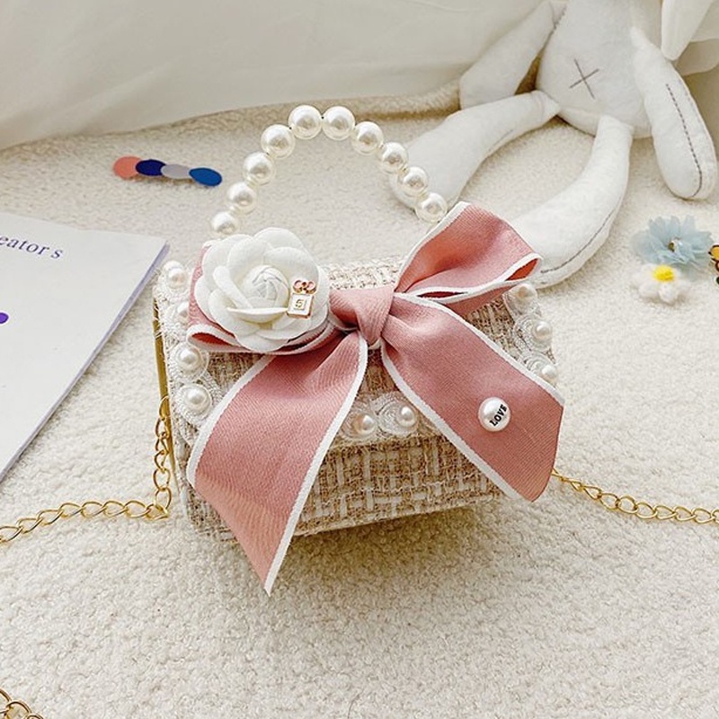 Túi Đeo Chéo Hình Nơ Đính Ngọc Trai Dễ Thương Cho Bé Gái