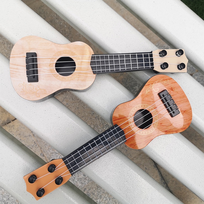 Đồ chơi đàn guitar mini 4 dây giáo dục sớm dành cho trẻ em