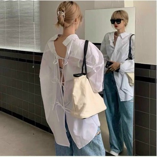 Áo sơ mi trắng cột nơ sau lưng